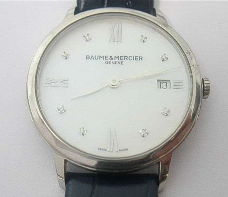 RELOJ BAUME & MERCIER CLASSIMA HOMBRE CON ESFERA DE DIAMANTE MADREPERLA CON ETIQUETA Foto 1 de 2