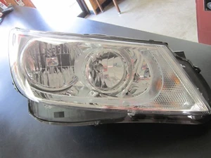 2010-2013 Buick Lacrosse headlight 2010 Buick Allure headlight GM 20941382 OEM - Picture 1 of 8
