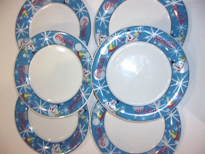 Juego de seis platos de cena vintage Coca Cola muñeco de nieve riendo azul Navidad Foto 1 de 4
