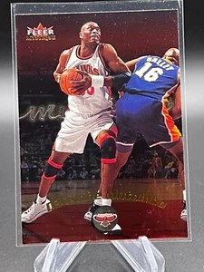 2000-01 Fleer Mystique - Dikembe Mutombo - Picture 1 of 3