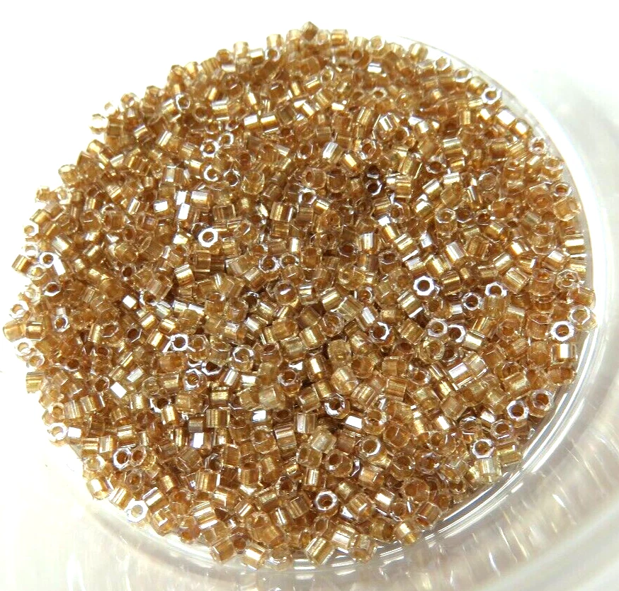 11/0 DELICA ~ DBC 907 ~ CRISTAL SPK CORTADO / BRONCE LT ~ 7 gramos ~ CUENTAS DE VIDRIO Foto 1 de 1