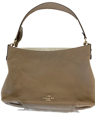 Bolso Hobo Coach de Cuero Color Taupe Diseño Minimalista Herrajes en Tono Dorado Foto 1 de 4