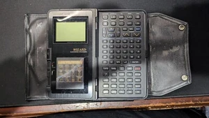 SHARP WIZARD OZ-7000 VINTAGE CALCULATOR/ORGANIZER 32K BYTES RAM CARD WORKS - Picture 1 of 11