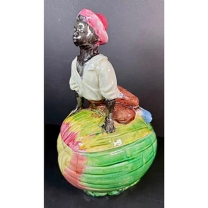 Antica scatola barattolo tabacco ceramica maiolica nera americana ragazzo su melone humidor - Foto 1 di 6