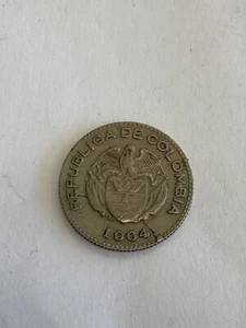 COLOMBIA 1964 10 CENTAVOS EAGLE ANIMAL ERROR COIN **CUD** - Picture 1 of 2