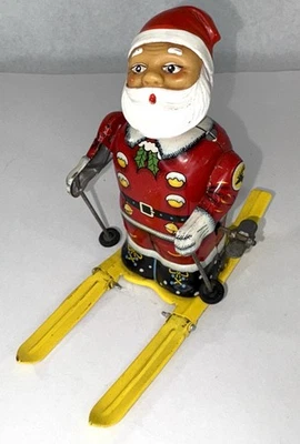 Juguete de hojalata vintage cuerda Santa Claus en esquís BANDAI esquí celuloide cabeza Japón Foto 1 de 4