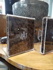 Vintage clear etched monogrammed lucite with cork mid-century bookends