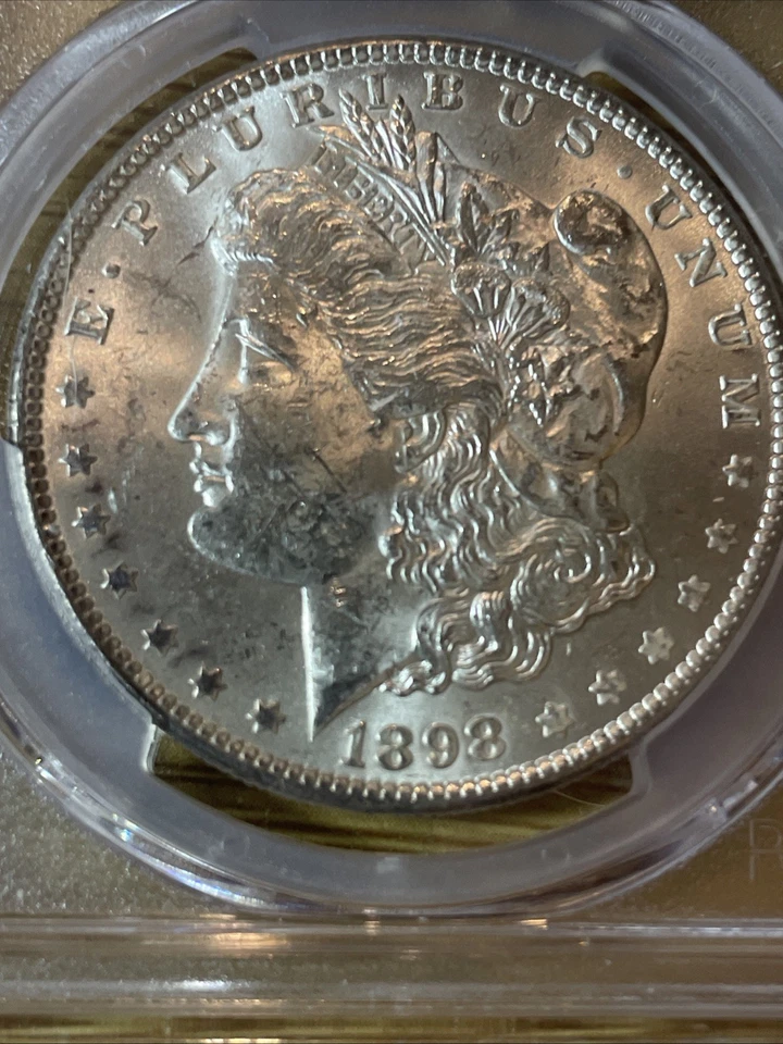 Серебряный Моргановский доллар 1898 O PCGS MS62 морозно-белый 90% чистое серебро - Изображение 1 из 3