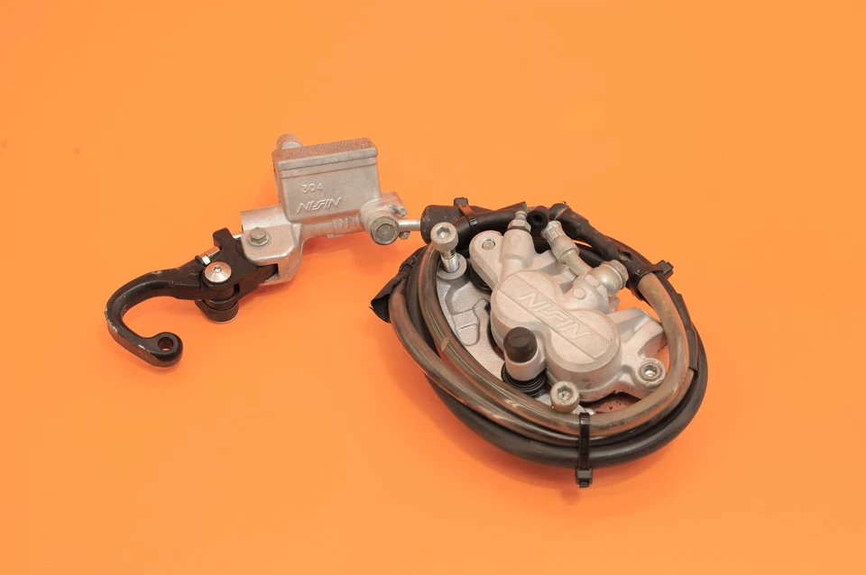 Soporte de pinza de freno delantero 2013 12-16 KX450F KX 450F cilindro maestro manguera palanca Foto 1 de 4