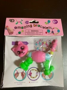 Increíbles Pulseras Mágicas Juguete NUEVO EN PAQUETE ELIGE UNICORNIO GATO PERRO CONEJO OSO - Imagen 1 de 22