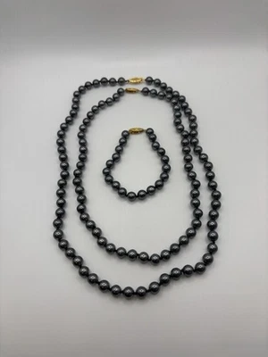 Juego de perlas de imitación negras Foto 1 de 4