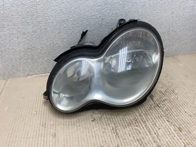 Faro lateral izquierdo conductor Mercedes-Benz Clase C 2005 a 2007 OEM O2996 DW Foto 1 de 4
