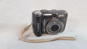 Appareil photo numérique 8 mégapixels Canon powershot a590 is UNIQUEMENT - Argent - Photo 1 sur 8