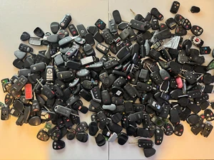LARGE LOT OF KEY FOBS OEM AND AFTERMARKET LOT UNTESTED LARGE BOX FILLED 23 - Picture 1 of 4