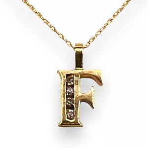 Collana con ciondolo in oro giallo 10 kt e diamanti iniziali ritagliato lettera F 18" - Foto 1 di 13