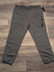 Banana Republic Reise Jogginghose Herren Large Schwarz Stretch Tapered Leg Neu - Bild 1 von 12