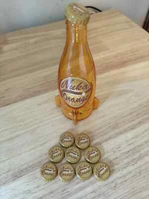 Fallout Nuka Cola Orange Glass Rocket Bottle & 10 Bottle Caps - Image 1 of 4