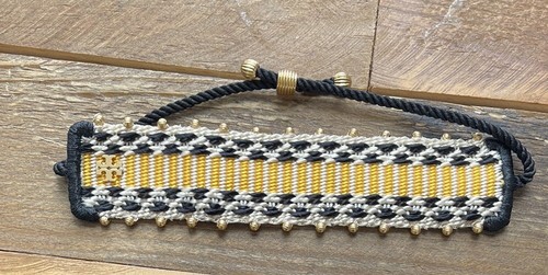 Bracciale regolabile in ottone tessile giallo nero Tory Burch