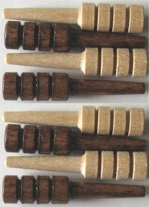 Eight Wood Cribbage Board Pegs (4 dark & 4 light color) - Image 1 of 1
