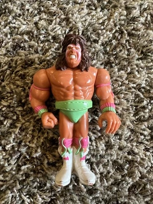 FIGURA DE ACCIÓN DE LUCHA LIBRE WWF WWE HASBRO - ULTIMATE WARRIOR SERIE 1990 1 Foto 1 de 3