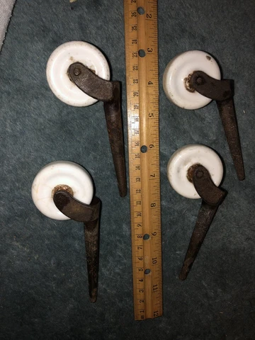 VINTAGE SET OF 4 ANTIQUE PORCELAIN CASTERS 1 3/4" WHEEL WHITE CERAMIC 3" POST Cover
