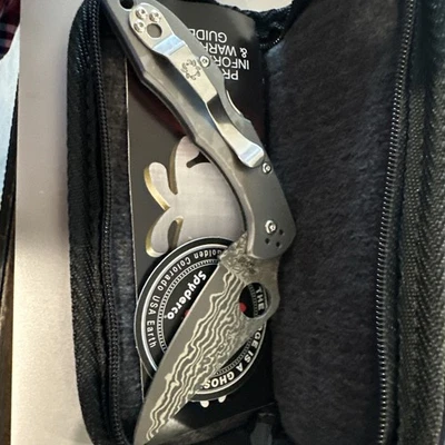 Spyderco Delica 4 Damascus VG10 Plain Blade Titanium Handles C11TIPD - Image 1 of 3