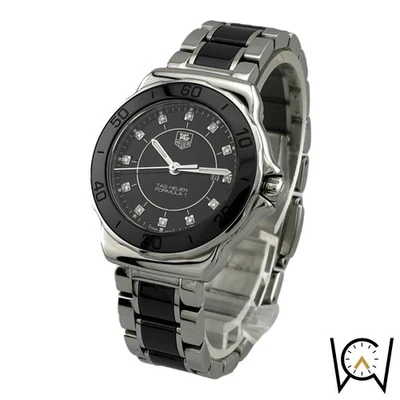 Reloj para mujer TAG Heuer Formula 1 WAH1314 diamantes negro 32 mm - Caja y papeles Foto 1 de 4