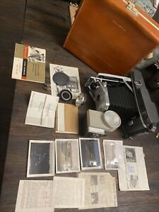 VINTAGE POLAROID LAND CAMERA MODEL 150 w/CASE, FLASH and accessories ,Pictures