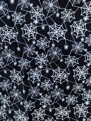 Ghostly Glow Town Henry Glass Fabrics Spiders Cobwebs Halloween Fabric 31" Long - Image 1 of 3