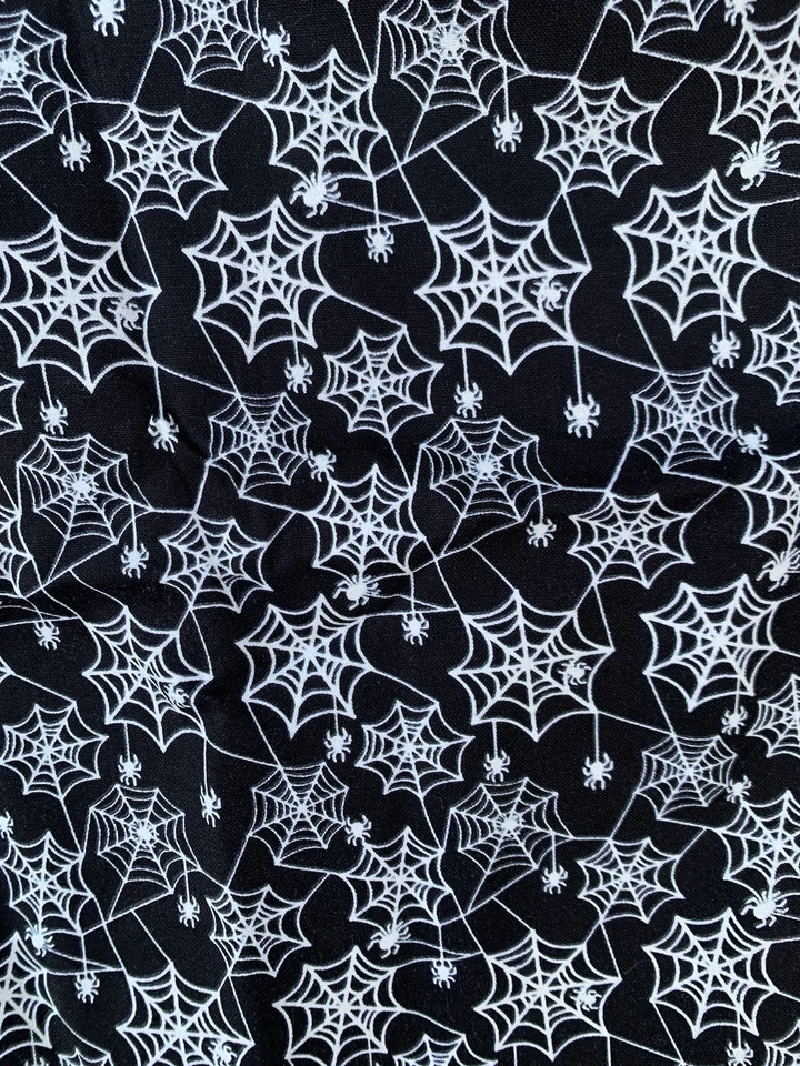 Ghostly Glow Town Henry Glass Fabrics Spiders Cobwebs Halloween Fabric 31" Long - Image 1 of 3