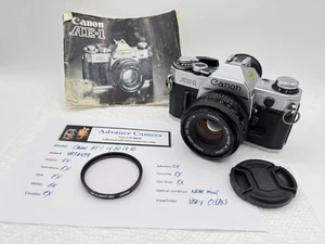 Película para cámara Canon AE-1 probada con lente FD de 50 mm excelente estado Sellos nuevos sin chirrido 6439 - Imagen 1 de 14