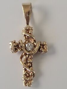 13kt gold solid nugget small custom cross pendant with diamond.