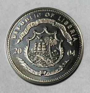 Moneda de la República de Liberia 2004 $10 George W. Bush como nueva estadounidense con certificado de autenticidad - Imagen 1 de 3