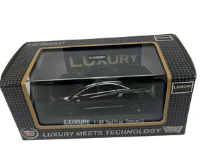 Luxury Diecast 1:43 2009 Cadillac Conver J Black New - Picture 1 of 8