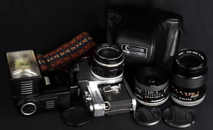 Canon PELLIX 35mm Película Mecánica SLR c/w 28mm, 50mm y 135mm Lente y Kit de Flash - Imagen 1 de 13