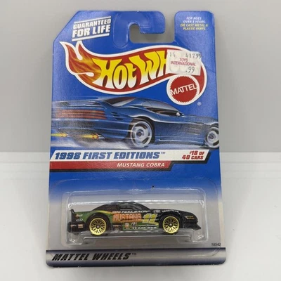 Hot Wheels 1998 #665 First Editions 18/40 Ford Mustang Cobra black w/gold Wheels - Image 1 of 3
