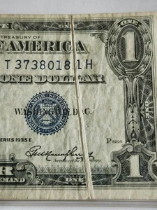 1935 E $1. Silver Certificate w/ Gutter fold error on face. Nice. - Picture 1 of 3