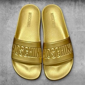 Authentic Moschino Women's Slides Sandals Embossed Logo Gold Metallic EU 39 US 9 - Picture 1 of 2