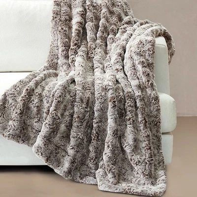 Manta mullida de piel sintética abigarrada con respaldo de micromink para sofá cama Foto 1 de 4