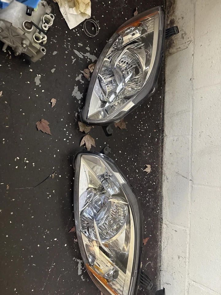 Conjunto de faros ocultos de xenón para Mitsubishi Eclipse CPE 2006-2012 izquierda derecha OEM Foto 1 de 1