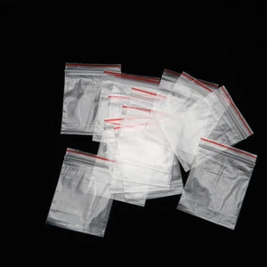 Mini conjunto de 100 bolsas de plástico transparentes con cremallera de 1,5" X 2,4" paquete de joyas - Imagen 1 de 3