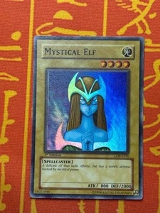 YUGIOH MYSTISCHE ELFE SUPER RARE 1.AUFLAGE LIGHT PLAY LOB-E050 - Bild 1 von 17