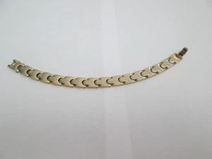 BRACCIALE MAGNETICO COLOR ORO/ARGENTO - Foto 1 di 4
