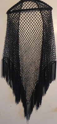 Black Openwork Crochet and Beaded Shawl Featuring Fringes Along The Edges. - Image 1 of 4