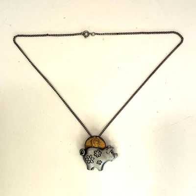 Hucha de peltre vintage con colgante de centavo de cobre collar de flores Foto 1 de 4