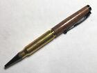 308 caliber bullet pen made with black walnut and a genuine brass casing