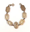 Vintage Brass-Tone Panel Link Bracelet with Girl?s Face Cameo in Center Panel