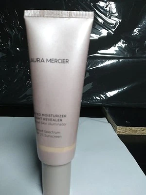 Crema hidratante tintada reveladora de luz Laura Mercier SPF25 0W1 perla, 1,7 oz 9/25 nueva sin caja Foto 1 de 4