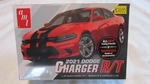 CARICABATTERIE DODGE AMT 2021 SCALA R/T 1/25 LIVELLO ABILITÀ 2 - Foto 1 di 2