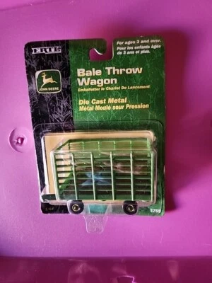  Ertl John Deere Bale Throw Wagon escala 1/64 #5755 nuevo en paquete Foto 1 de 2